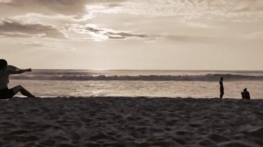 Puerto Escondido Oaxaca Mexico 04. October 2022 Beautiful stunning colorful and golden sunset in yellow orange red on beach and big wave panorama in Zicatela Puerto Escondido Oaxaca Mexico.
