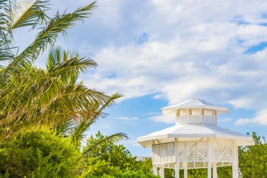 White noble pergula pavilion in paradise on the beach with palm trees in Playa del Carmen Quintana Roo Mexico.