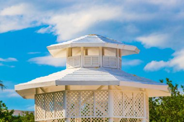 White noble pergula pavilion in paradise on the beach with palm trees in Playa del Carmen Quintana Roo Mexico.