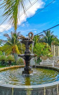 Fountain in the park with scorpion statue figure in Zicatela Puerto Escondido Oaxaca Mexico.