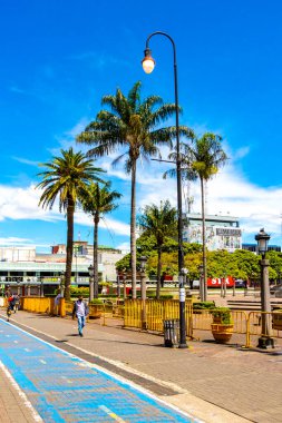 Merced San Jose Costa Rica 08. August 2021 Colorful street with cars stores trade buildings houses architecture and people in Merced San Jose Costa Rica in Central America.