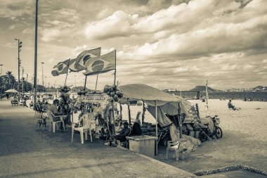 Rio de Janeiro Brazil 18. October 2020 People tourist palm trees Acai acai shops and stores on Flamengo Beach panorama view and cityscape at Guanabara Bay Flamengo Rio de Janeiro Brazil.