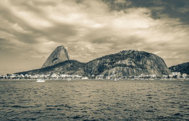 Sugarloaf sugar loaf mountain Pao de Azucar panorama view and cityscape of the Urca village in Rio de Janeiro Brazil.