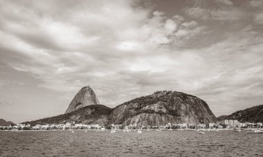 Sugarloaf sugar loaf mountain Pao de Azucar panorama view and cityscape of the Urca village in Rio de Janeiro Brazil.