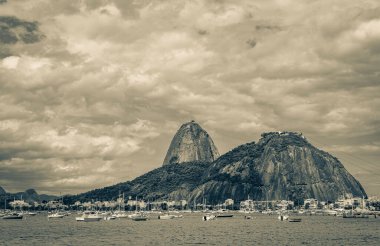 Sugarloaf sugar loaf mountain Pao de Azucar panorama view and cityscape of the Urca village in Rio de Janeiro Brazil.