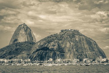 Sugarloaf sugar loaf mountain Pao de Azucar panorama view and cityscape of the Urca village in Rio de Janeiro Brazil.