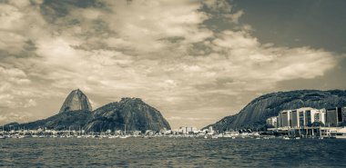 Sugarloaf sugar loaf mountain Pao de Azucar panorama view and cityscape of the Urca village in Rio de Janeiro Brazil.