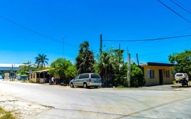 Chiquila Quintana Roo Mexico 16. May 2022 Small village place with port ferry road houses people and cars in Chiquila Lazaro Cardenas in Quintana Roo Mexico.
