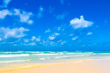 Tropical caribbean beach landscape panorama with clear turquoise blue water in Playa del Carmen Mexico.