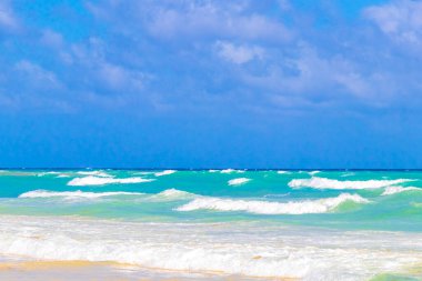 Tropical caribbean beach landscape panorama with clear turquoise blue water in Playa del Carmen Mexico.