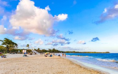 Tropical caribbean beach landscape panorama with clear turquoise blue water in Playa del Carmen Mexico.