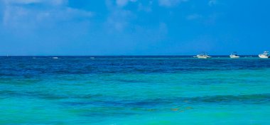 Boat yacht ship ferry jetty pier and harbor at the tropical mexican caribbean beach panorama view in Playa del Carmen Quintana Roo Mexico.