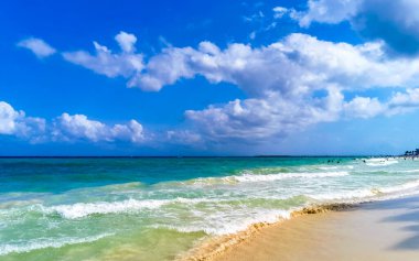 Tropical caribbean beach landscape panorama with clear turquoise blue water in Playa del Carmen Mexico.