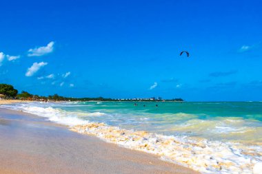 Tropical caribbean beach landscape panorama with clear turquoise blue water in Playa del Carmen Mexico.