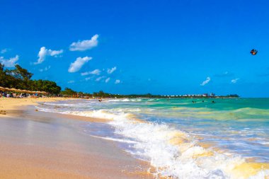 Tropical caribbean beach landscape panorama with clear turquoise blue water in Playa del Carmen Mexico.