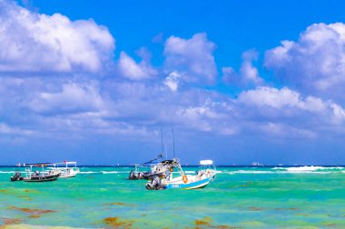 Boat yacht ship ferry jetty pier and harbor at the tropical mexican caribbean beach panorama view in Playa del Carmen Quintana Roo Mexico.