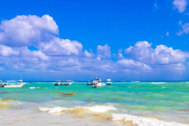 Boat yacht ship ferry jetty pier and harbor at the tropical mexican caribbean beach panorama view in Playa del Carmen Quintana Roo Mexico.