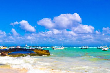 Boat yacht ship ferry jetty pier and harbor at the tropical mexican caribbean beach panorama view in Playa del Carmen Quintana Roo Mexico.