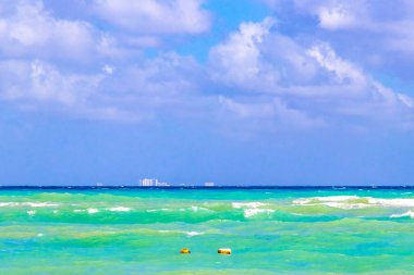 Tropical caribbean beach landscape panorama with clear turquoise blue water in Playa del Carmen Mexico.