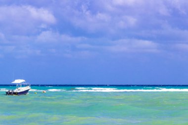 Boat yacht ship ferry jetty pier and harbor at the tropical mexican caribbean beach panorama view in Playa del Carmen Quintana Roo Mexico.