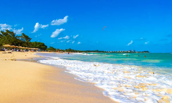 Tropical caribbean beach landscape panorama with clear turquoise blue water in Playa del Carmen Mexico.