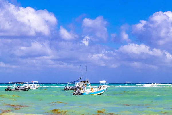 Boat yacht ship ferry jetty pier and harbor at the tropical mexican caribbean beach panorama view in Playa del Carmen Quintana Roo Mexico.