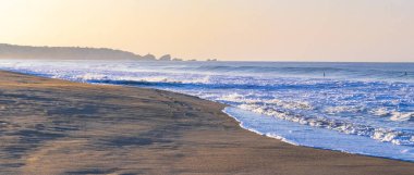 Extremely huge big surfer waves on the beach at La Punta de Zicatela Puerto Escondido Oaxaca Mexico.