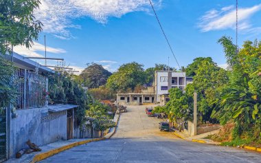 Puerto Escondido Oaxaca Mexico 2022 Busy road street driving cars traffic jam and places in Zicatela Puerto Escondido Oaxaca Mexico.