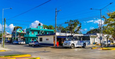 Playa del Carmen Quintana Roo Mexico 2021 Typical street road and cityscape with cars traffic restaurants shops stores people and buildings of Playa del Carmen in Quintana Roo Mexico.