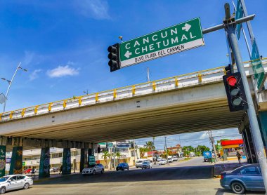 Playa del Carmen Mexico 12. July 2021 Typical Highway Freeway bridge and street road and cityscape with cars buildings of Playa del Carmen in Mexico.