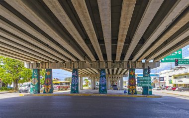 Playa del Carmen Mexico 12. July 2021 Typical Highway Freeway bridge and street road and cityscape with cars buildings of Playa del Carmen in Mexico.