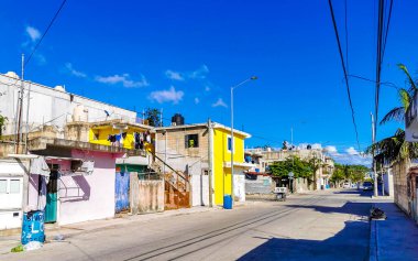 Playa del Carmen Quintana Roo Mexico 2021 Typical street road and cityscape with cars traffic restaurants shops stores people and buildings of Playa del Carmen in Quintana Roo Mexico.