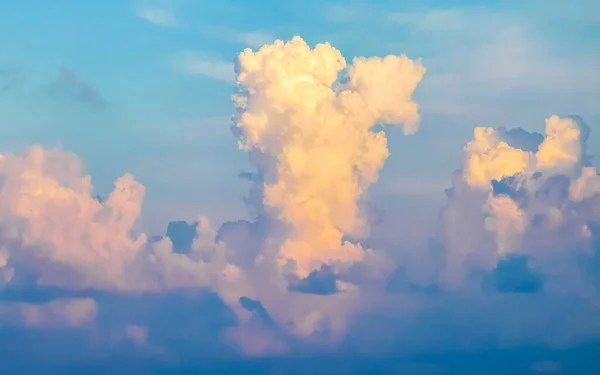 Explosive cloud formation cumulus clouds in the sky in Playa del Carmen Quintana Roo Mexico.
