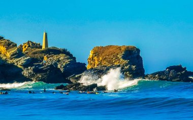 Extremely huge big surfer waves on the beach at La Punta de Zicatela Puerto Escondido Oaxaca Mexico.