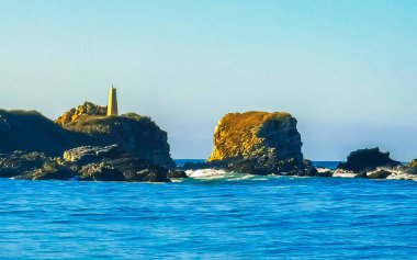 Extremely huge big surfer waves on the beach at La Punta de Zicatela Puerto Escondido Oaxaca Mexico.