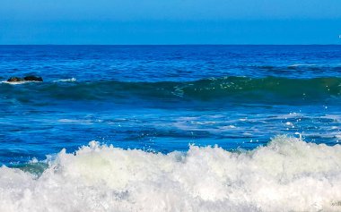 Extremely huge big powerful surfer waves on the beach in Zicatela Puerto Escondido Oaxaca Mexico.