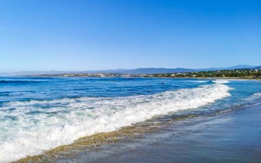 Extremely huge big powerful surfer waves on the beach in Zicatela Puerto Escondido Oaxaca Mexico.