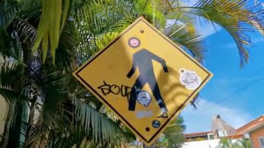 Playa del Carmen Quintana Roo Mexico 08. September 2022 Yellow pedestrian sign street sign in Playa del Carmen Quintana Roo Mexico.