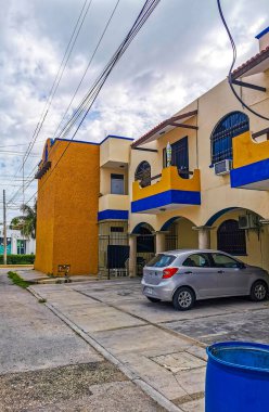Playa del Carmen in Quintana Roo Mexico 02. July 2021 Typical street road and cityscape with cars traffic restaurants shops stores people and buildings of Playa del Carmen in Quintana Roo Mexico.