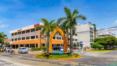 Playa del Carmen Quintana Roo Mexico 12. July 2021 Tourist street road with traffic circle and tropical palms palm trees in Playa del Carmen Quintana Roo Mexico.