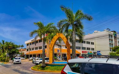 Playa del Carmen Quintana Roo Mexico 12. July 2021 Tourist street road with traffic circle and tropical palms palm trees in Playa del Carmen Quintana Roo Mexico.