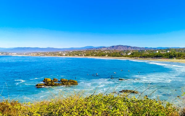 Stock image Beautiful tropical and natural city and seascape landscape panorama view with pacific ocean sea palms palm trees and beach with waves of Zicatela Puerto Escondido Oaxaca Mexico.