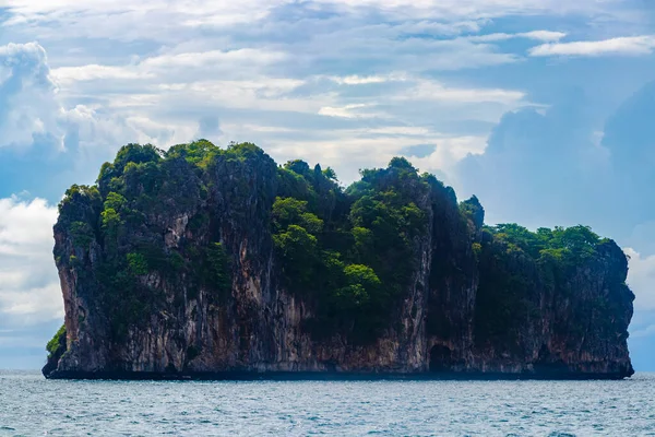 stock image Limestone rocks hills mountains and turquoise blue water in Phang Nga Bay Krabi Thailand in Southeast Asia.