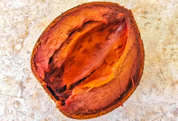 stock image Sliced delicious Big Sapote Mamey fruit in Playa del Carmen Quintana Roo Mexico.