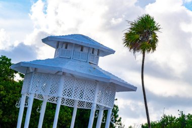 White noble pergula pavilion in paradise on the beach with palm trees in Playa del Carmen Quintana Roo Mexico.