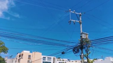 Absolute cable chaos on Thai power pole in Playa del Carmen Quintana Roo Mexico.