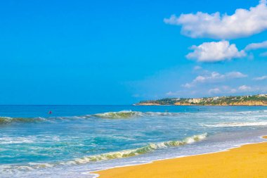 Extremely huge big powerful surfer waves on the beach in Zicatela Puerto Escondido Oaxaca Mexico.