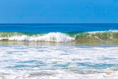 Extremely huge big powerful surfer waves on the beach in Zicatela Puerto Escondido Oaxaca Mexico.