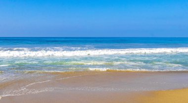 Extremely huge big powerful surfer waves on the beach in Zicatela Puerto Escondido Oaxaca Mexico.