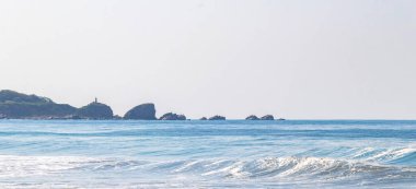 Extremely huge big surfer waves on the beach at La Punta de Zicatela Puerto Escondido Oaxaca Mexico.